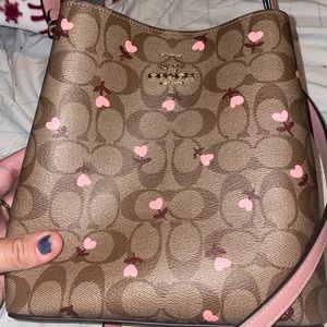 Coach leather purse hearts designed
